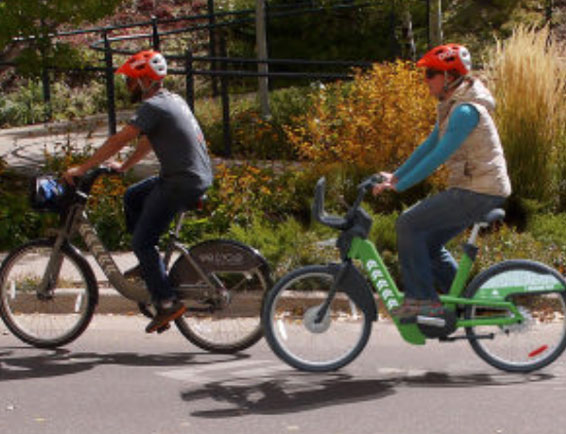 A WE-cycle e-biker and cyclist